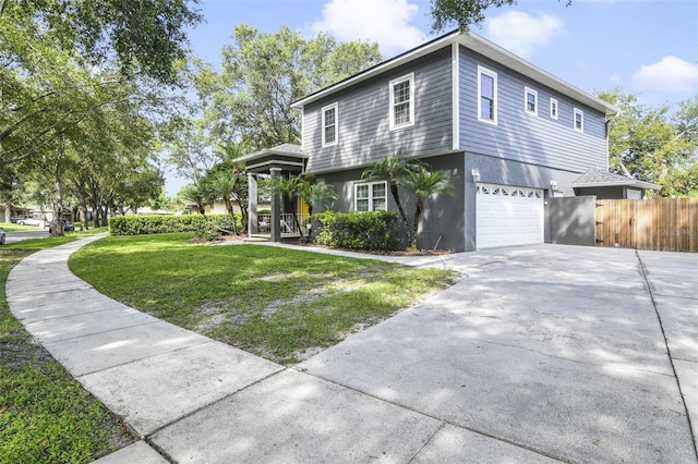 8445 Shady Glen Dr, Orlando, FL 32819 - view of front of home featuring a garage, concrete driveway, and stucco siding