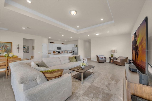 3702 Haddon Ave, Davenport, FL 33837 - living area featuring a tray ceiling, recessed lighting, light tile patterned floors, and ornamental molding