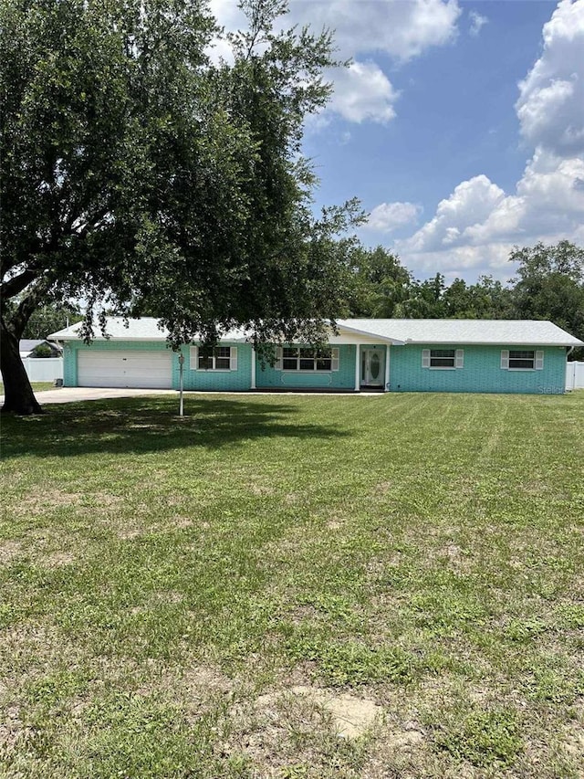 608 Knowles Rd, Brandon, FL 33511 - view of front of house featuring a front lawn