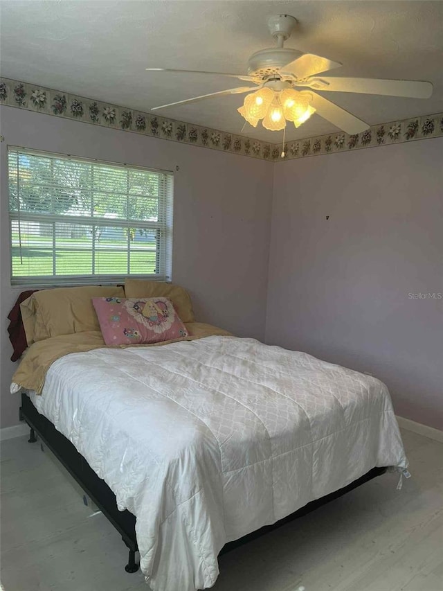 608 Knowles Rd, Brandon, FL 33511 - bedroom with baseboards and ceiling fan