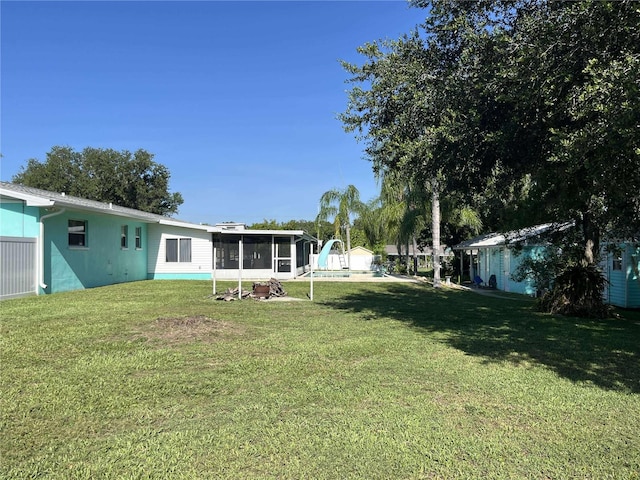 608 Knowles Rd, Brandon, FL 33511 - view of green lawn with a sunroom