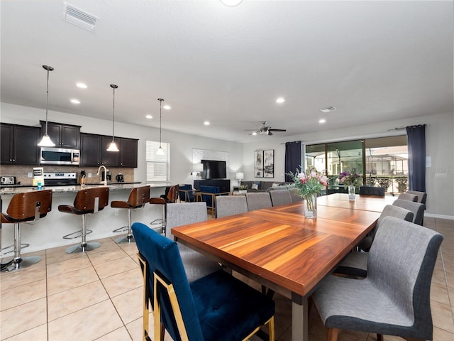 1626 Lima Ave, Kissimmee, FL 34747 - dining space featuring light tile patterned floors, recessed lighting, and a ceiling fan