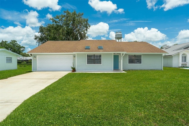 2025 Mango Tree Dr, Edgewater, FL 32141 - ranch-style house featuring an attached garage, driveway, and a front yard