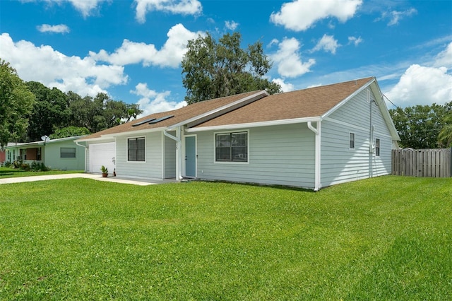 2025 Mango Tree Dr, Edgewater, FL 32141 - ranch-style house featuring an attached garage, driveway, and roof with shingles