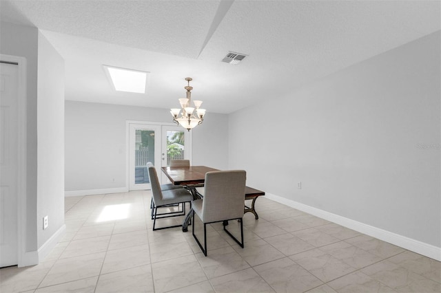 2025 Mango Tree Dr, Edgewater, FL 32141 - dining space with a chandelier and baseboards