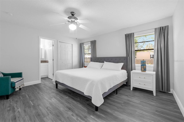 2025 Mango Tree Dr, Edgewater, FL 32141 - bedroom with wood finished floors, a ceiling fan, and a closet