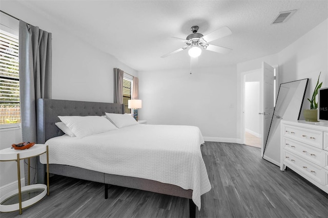 2025 Mango Tree Dr, Edgewater, FL 32141 - bedroom featuring dark wood-type flooring and ceiling fan