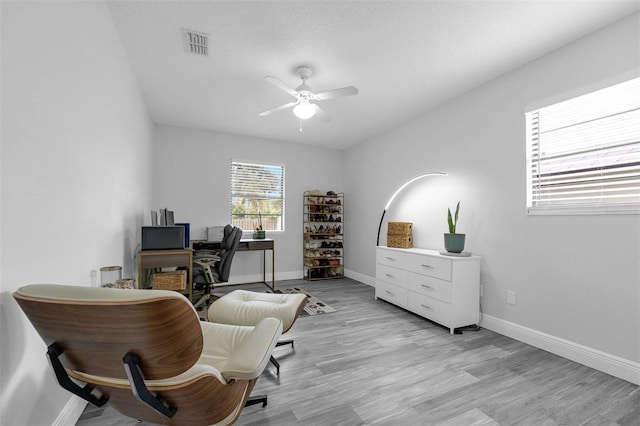 2025 Mango Tree Dr, Edgewater, FL 32141 - home office featuring a ceiling fan and light wood finished floors