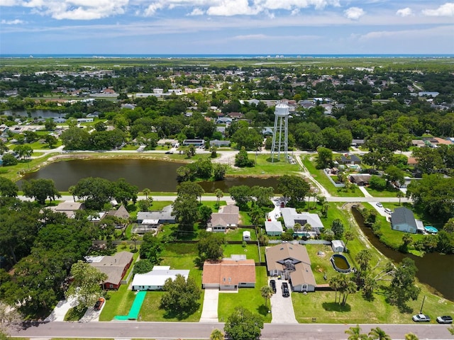 2025 Mango Tree Dr, Edgewater, FL 32141 - aerial view of residential area featuring a large body of water and a tree filled landscape