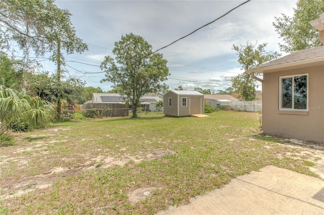 663 Courtland Blvd, Deltona, FL 32738 - fenced backyard featuring a storage shed