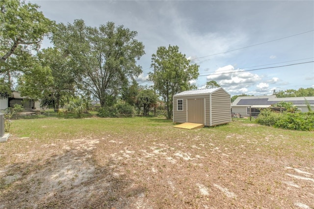 663 Courtland Blvd, Deltona, FL 32738 - fenced backyard with a storage unit