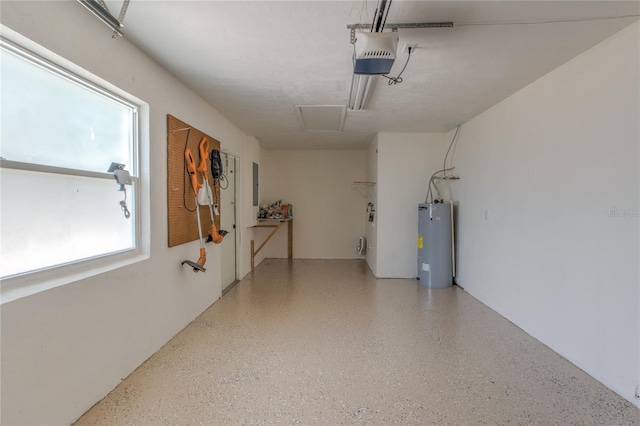 663 Courtland Blvd, Deltona, FL 32738 - garage featuring electric water heater and a garage door opener