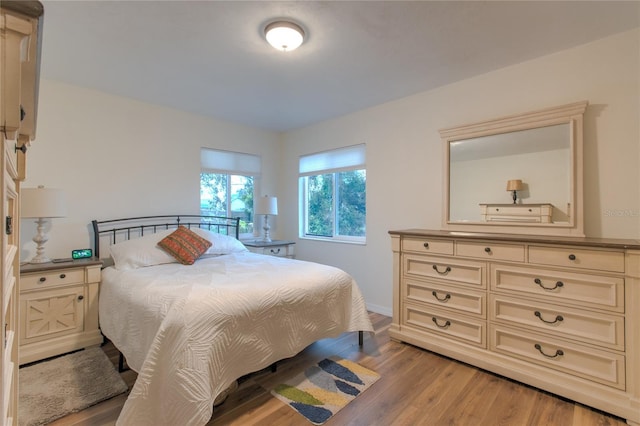 663 Courtland Blvd, Deltona, FL 32738 - bedroom with light wood-type flooring and baseboards
