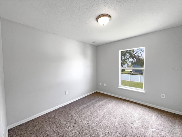1301 Brenway Dr, Mascotte, FL 34753 - unfurnished room featuring carpet and a textured ceiling