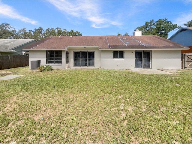 6460 Preakness Dr, Orlando, FL 32818 - rear view of house featuring a chimney and a patio area