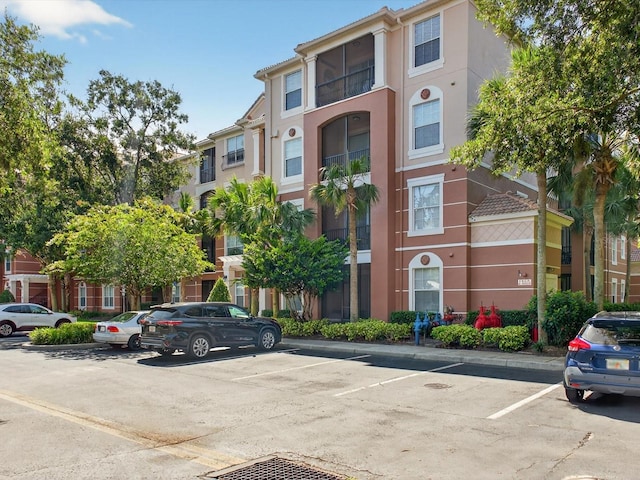 1353 Venezia Ct Unit 205, Davenport, FL 33896 - view of property featuring uncovered parking