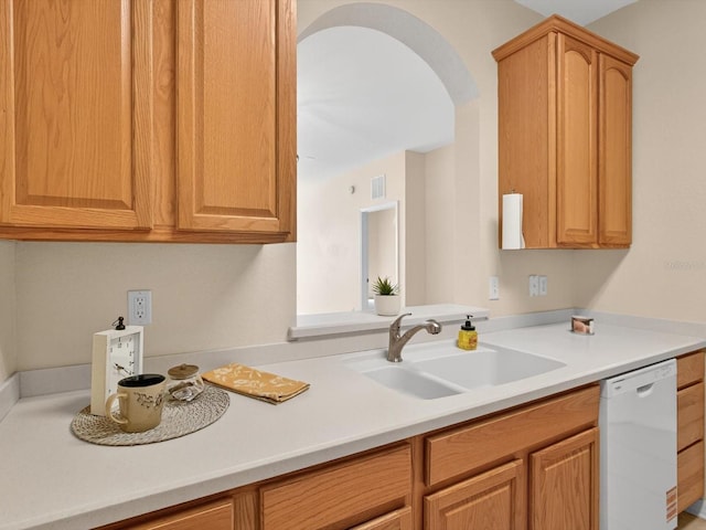 1353 Venezia Ct Unit 205, Davenport, FL 33896 - kitchen with dishwasher, light countertops, and arched walkways