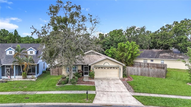 10901 Peppersong Dr, Riverview, FL 33578 - view of front of house featuring a garage, driveway, and stucco siding