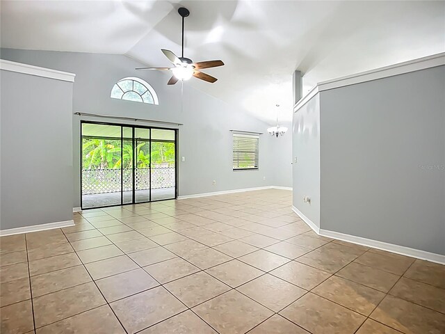10901 Peppersong Dr, Riverview, FL 33578 - spare room featuring light tile patterned flooring, ceiling fan, high vaulted ceiling, and a chandelier