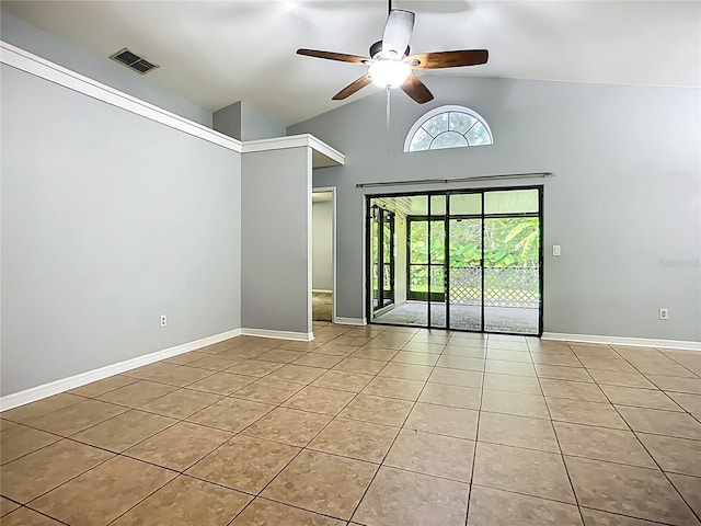 10901 Peppersong Dr, Riverview, FL 33578 - empty room featuring tile patterned floors, a ceiling fan, and high vaulted ceiling