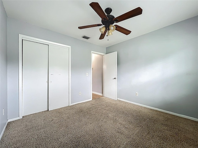 10901 Peppersong Dr, Riverview, FL 33578 - unfurnished bedroom with carpet, a closet, and ceiling fan
