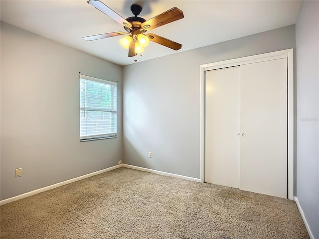 10901 Peppersong Dr, Riverview, FL 33578 - unfurnished bedroom featuring carpet floors, a closet, and ceiling fan