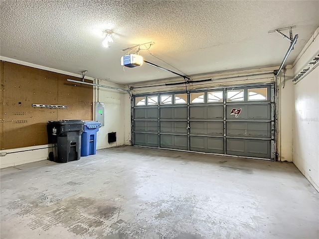 10901 Peppersong Dr, Riverview, FL 33578 - garage featuring a garage door opener