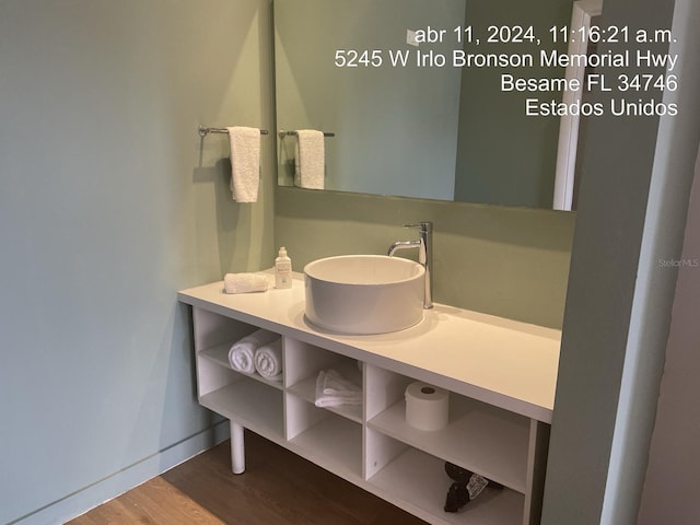5245 W Irlo Bronson Memorial Hwy Unit 185, Kissimmee, FL 34746 - bathroom featuring wood finished floors and baseboards
