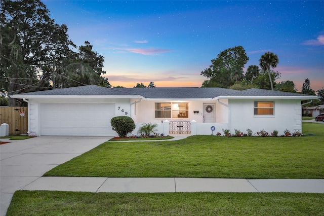 749 Ridge Blvd, South Daytona, FL 32119 - ranch-style home with a garage, driveway, and stucco siding