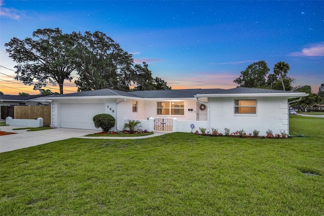 749 Ridge Blvd, South Daytona, FL 32119 - ranch-style house with a garage, driveway, and stucco siding