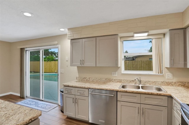 749 Ridge Blvd, South Daytona, FL 32119 - kitchen with dishwasher, light countertops, dark wood-style flooring, gray cabinetry, and recessed lighting