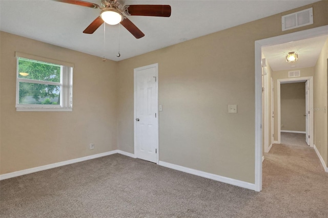 749 Ridge Blvd, South Daytona, FL 32119 - empty room with carpet floors and ceiling fan