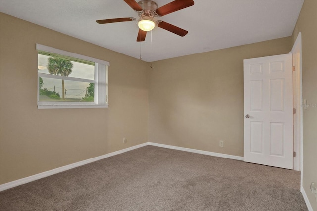 749 Ridge Blvd, South Daytona, FL 32119 - carpeted empty room featuring baseboards and ceiling fan