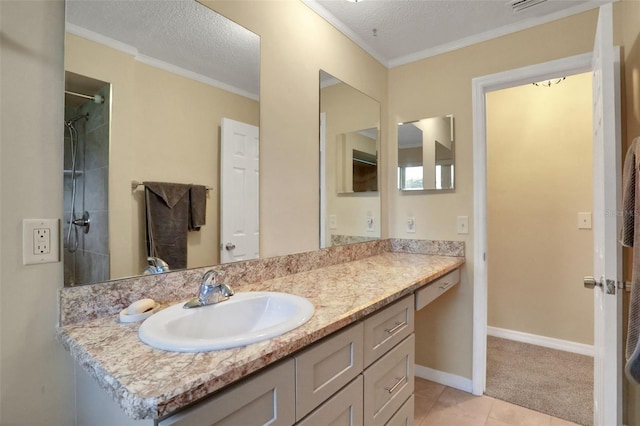 749 Ridge Blvd, South Daytona, FL 32119 - full bathroom featuring vanity, a textured ceiling, ornamental molding, tile patterned floors, and a shower