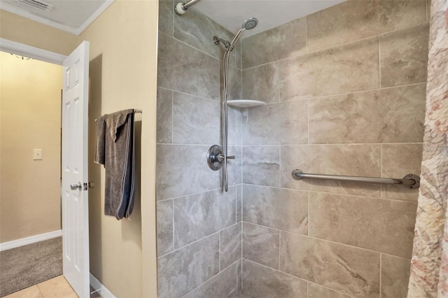 749 Ridge Blvd, South Daytona, FL 32119 - bathroom with a tile shower and baseboards