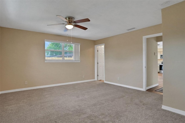 749 Ridge Blvd, South Daytona, FL 32119 - carpeted empty room featuring a ceiling fan and baseboards