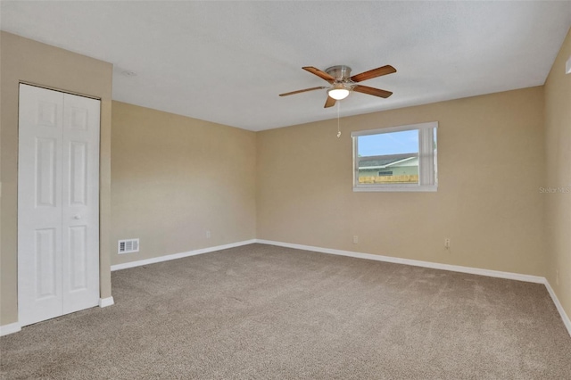 749 Ridge Blvd, South Daytona, FL 32119 - carpeted spare room featuring a ceiling fan and baseboards