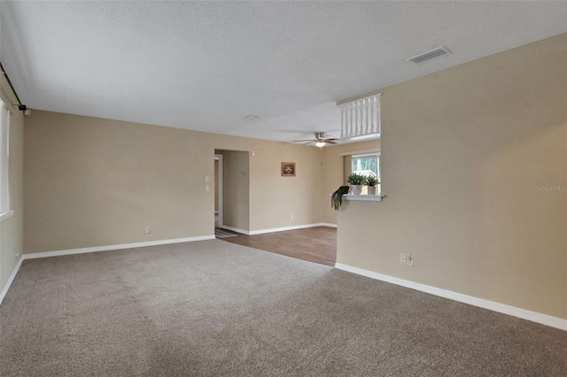 749 Ridge Blvd, South Daytona, FL 32119 - carpeted empty room featuring a ceiling fan and a textured ceiling