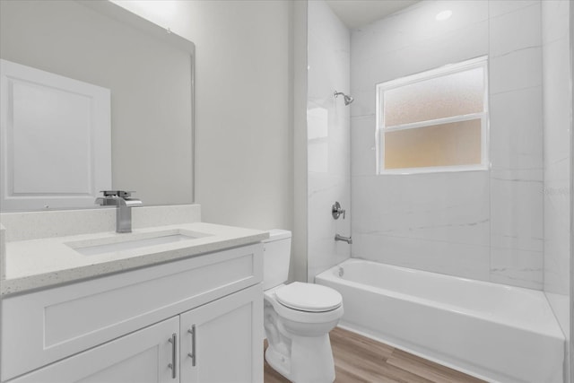 13673 SW 43th Cir, Ocala, FL 34473 - bathroom with vanity,  shower combination, and wood finished floors