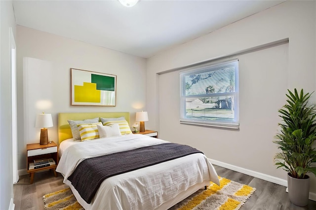 1175 Tracy Dr, Port Orange, FL 32129 - bedroom with wood finished floors and baseboards