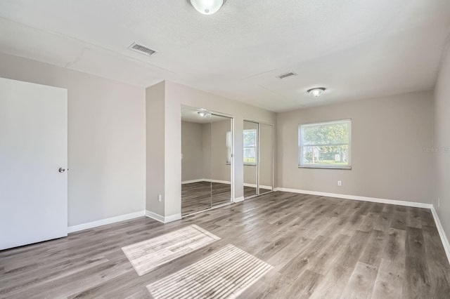 1175 Tracy Dr, Port Orange, FL 32129 - unfurnished room featuring wood finished floors