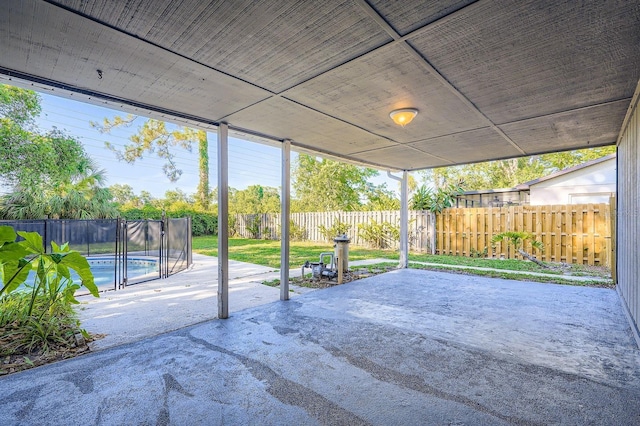 1175 Tracy Dr, Port Orange, FL 32129 - fenced backyard with a patio area