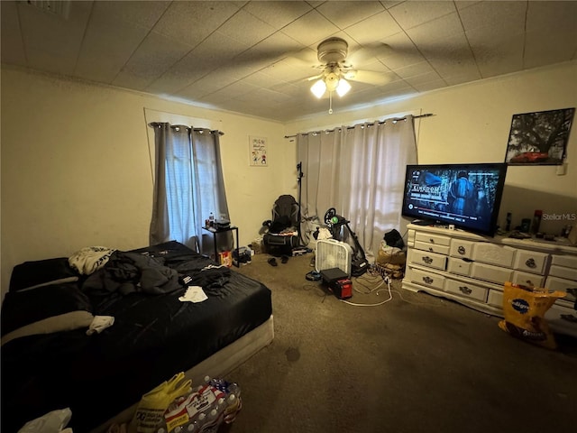 207 E Orange St, Kissimmee, FL 34744 - carpeted bedroom featuring a ceiling fan
