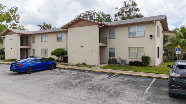 1918 Honour Rd Unit 4, Orlando, FL 32839 - view of building exterior with uncovered parking