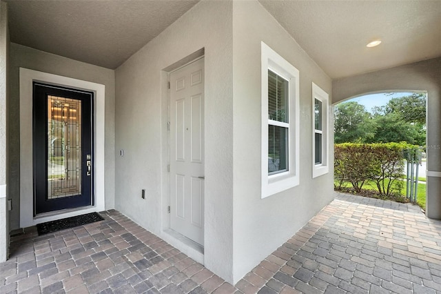 15315 Gilligan Ct, Winter Garden, FL 34787 - property entrance with stucco siding