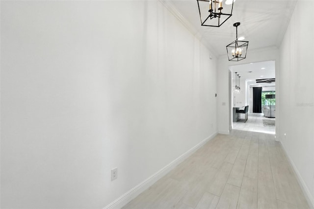 15315 Gilligan Ct, Winter Garden, FL 34787 - hall featuring a chandelier and crown molding