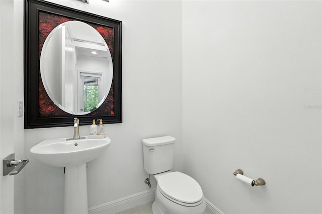 15315 Gilligan Ct, Winter Garden, FL 34787 - half bath featuring toilet and baseboards