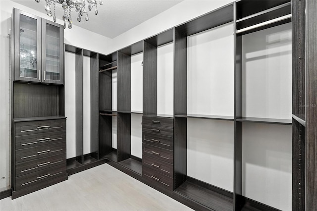 15315 Gilligan Ct, Winter Garden, FL 34787 - spacious closet with a chandelier