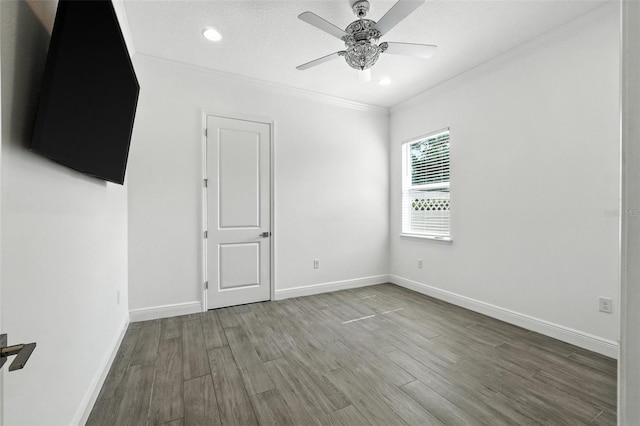15315 Gilligan Ct, Winter Garden, FL 34787 - empty room featuring ornamental molding, wood finished floors, ceiling fan, and recessed lighting