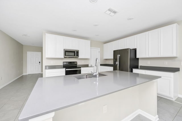 4288 Blackshear Ct, Clermont, FL 34714 - kitchen with stainless steel microwave, black electric range oven, refrigerator with ice dispenser, and white cabinets